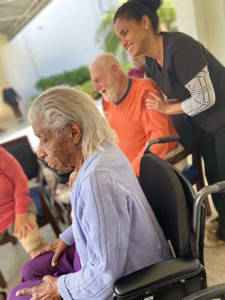 Group participating in a chair-yoga breathing exercise